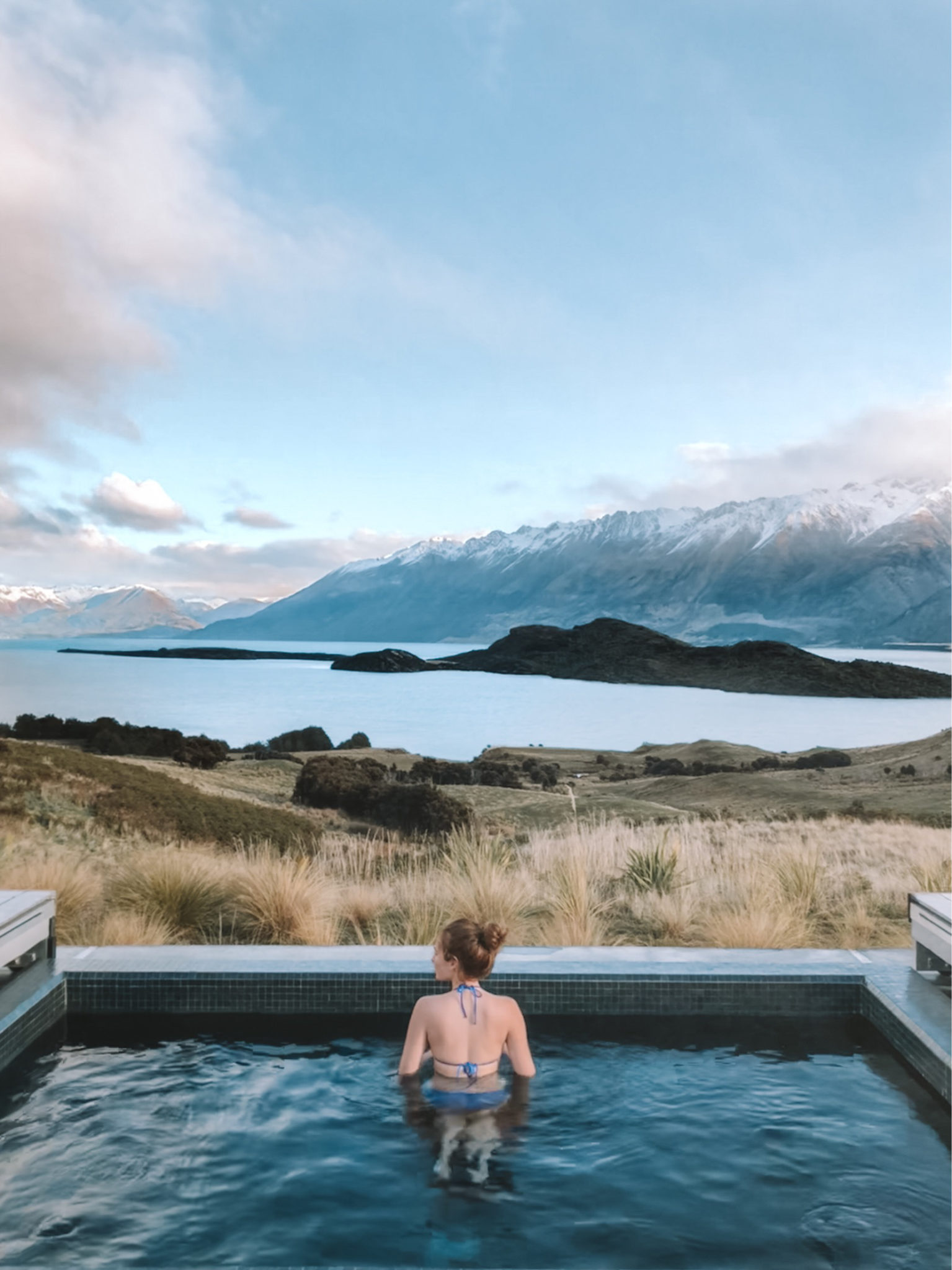 Soaking in the outdoor pool at Aro Hā, overlooking Lake Wakatipu, New Zealand