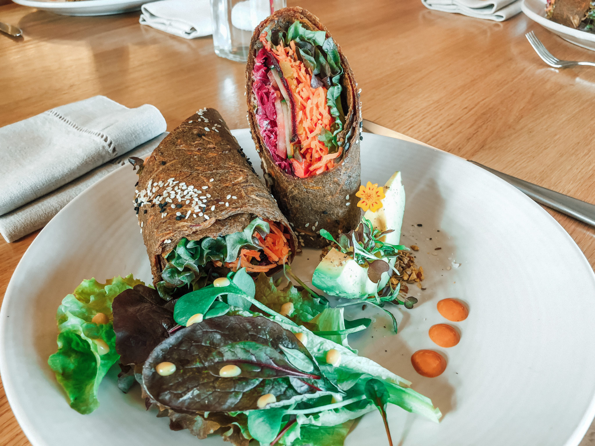 Plant-based wrap and salad lunch at Aro Hā